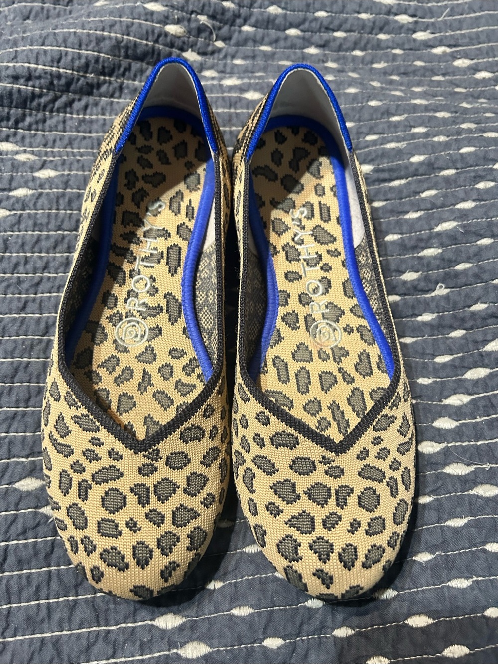 Rothy’s Leopard Print Slip-On Flats with Blue Trim